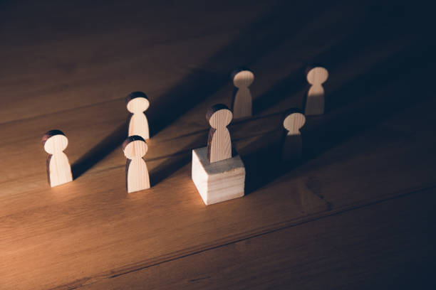 istock Teamwork and organization with wooden figures 1325190447