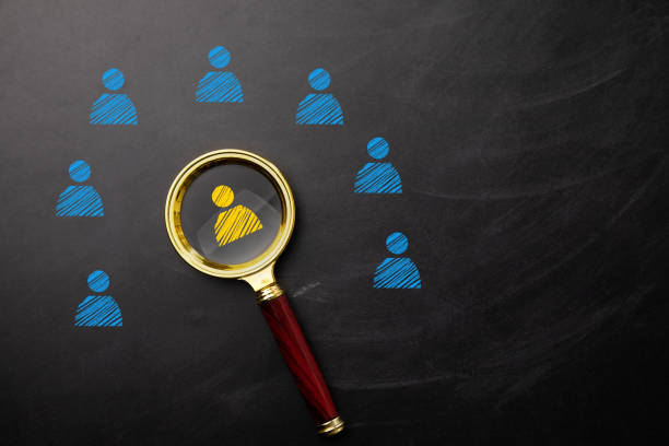 istock magnifier with people icon on chalkboard 1325190494