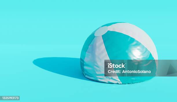 Deflated Beach Ball Stock Photo - Download Image Now - Deflated, Swimming Pool, Beach Ball