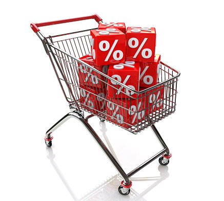Shopping cart with cubes of percent when you make a trade-related information and discounts. 3d illustration