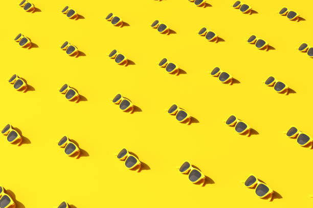 istock Minimal trendy scene of yellow sunglasses pattern on background, Summer concept, 3D rendering. 1325202046