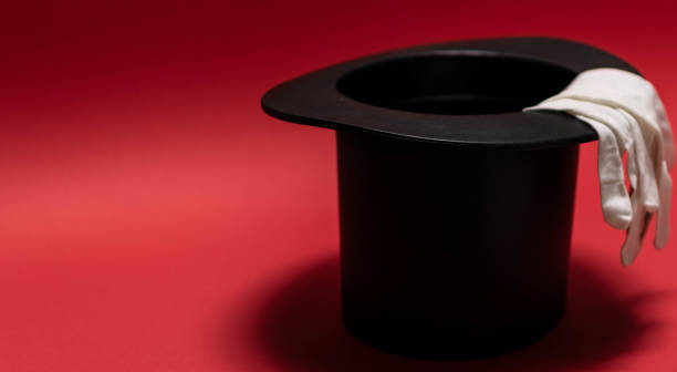istock Gentleman's club, top hat, white gloves, bow tie, on a red background. 1325202905