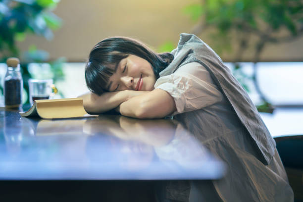 istock A young woman napping in a moderately bright room 1325202939
