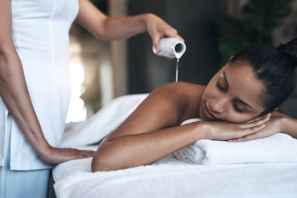 istock Shot of a young woman getting a back massage at a spa 1325202964