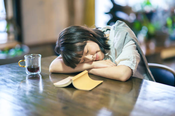 istock A young woman napping in a moderately bright room 1325203080