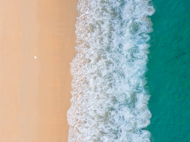 istock Top view sea water on beach sand 1325205508
