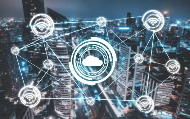 Photo of Cloud computing data with Wifi internet connection over aerial view of Bangkok city at night. Double exposure. Smart city concept.