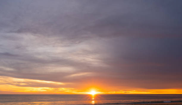 istock Beach sea and sunset sky 1325205903
