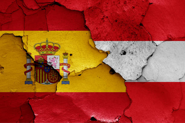 istock flags of Spain and Austria painted on cracked wall 1325208736