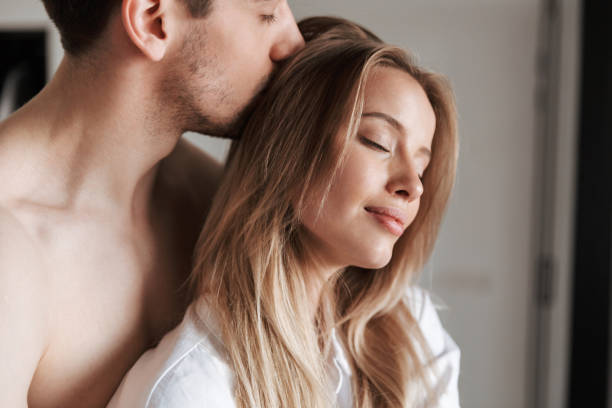 istock Young cute pleased loving couple 1325214182