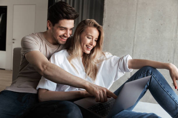 istock Young excited surprised happy loving couple 1325214558