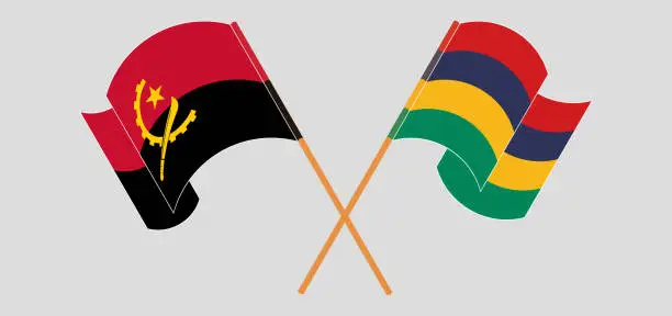 Vector illustration of Crossed and waving flags of Angola and Mauritius