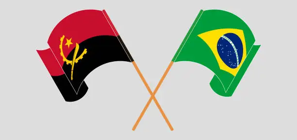 Vector illustration of Crossed and waving flags of Angola and Brazil