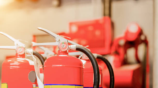 istock The red fire extinguisher is ready for use in case of an indoor fire emergency. 1325217570