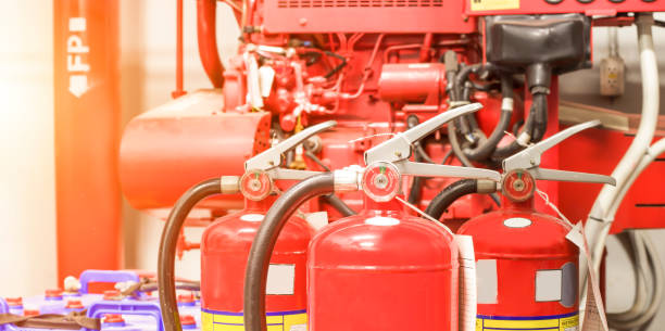 istock The red fire extinguisher is ready for use in case of an indoor fire emergency. 1325217657