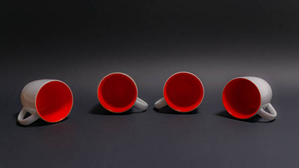 istock Pattern made of coffee or tea cups on different colored background, top view, abstract. 1325224351