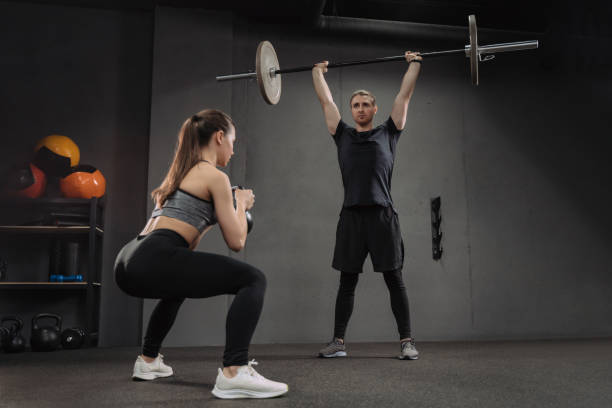 istock Couple training together at gym 1325224430