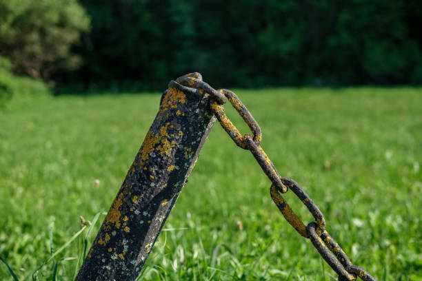 istock Metal pole with a chain, closeup. 1325230871