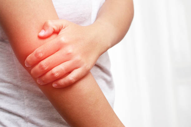 istock Man in pain in his arm 1325232058