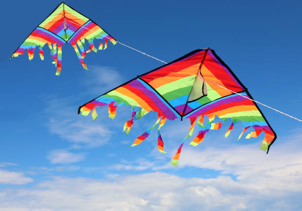 istock two colorful kites flying high in the sky with brightly colored 1325233886