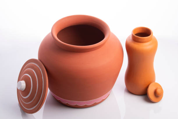 A pair of Clay pot isolated on Black background.