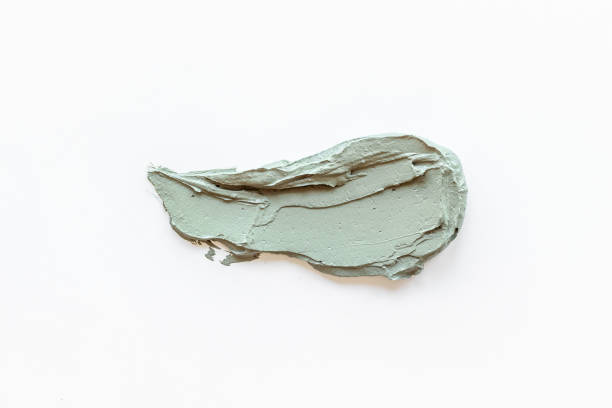 istock Texture of cosmetic clay mask isolated on white 1325239823
