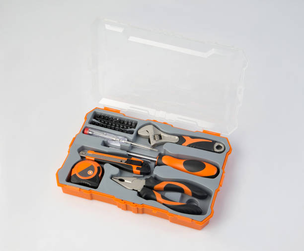 istock Orange color tool box with instrument and tools isolated on white 1325243605