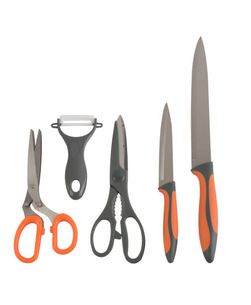 istock A group of knives, scissors and peeler isolated on white 1325243609