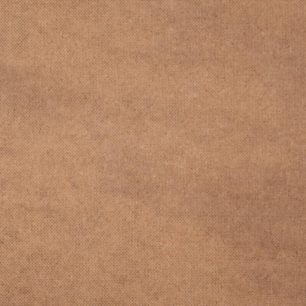 istock Textured background from the ribbed side of hardboard. 1325243706
