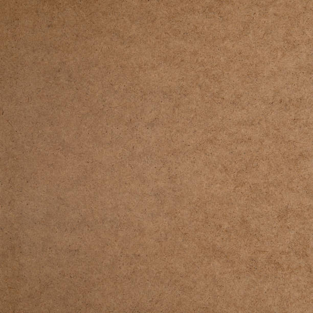 istock Textured background from the smooth side of hardboard. 1325243733