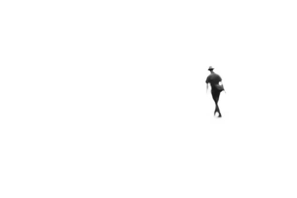 istock Silhouette of walking man 1325246679