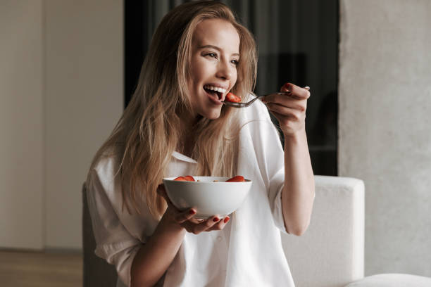 istock Attractive young woman dressed in white shirt 1325249882