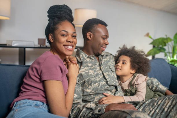 istock Serviceman young man on vacation at home 1325250237