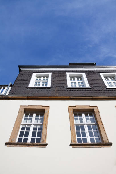 istock View up facade with schist part on top 1325253056