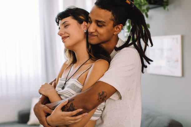 istock Adorable lovers bonding indoors 1325254155