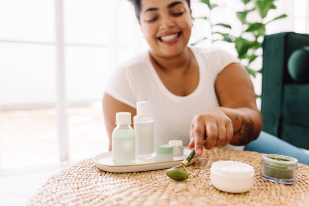 istock Woman holding jade roller for skin care 1325256748