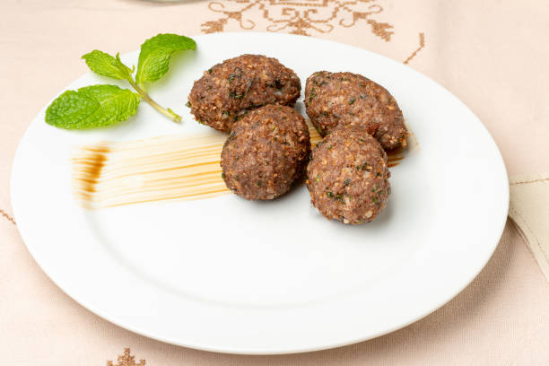 istock baked kibbeh on a white plate arabic food 1325260687