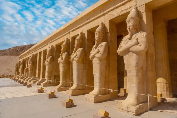 Photo of Sculptures of pharaohs entering the Funerary Temple of Hatshepsut in Luxor. Egypt