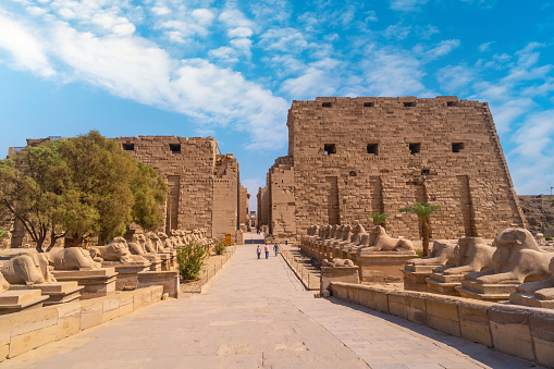 Ramesseum, Theban Necropolis, Luxor, Egypt - July 22, 2022:  The Ramesseum is the memorial temple (or mortuary temple) of Pharaoh Ramesses II. It is located in the Theban Necropolis in Upper Egypt, on the west of the River Nile, across from the modern city of Luxor. The name – or at least its French form Rhamesséion – was coined by Jean-François Champollion, who visited the ruins of the site in 1829 and first identified the hieroglyphs making up Ramesses's names and titles on the walls.