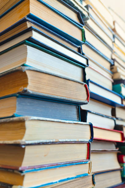 istock Background. Many old books and textbooks are in the library 1325263905