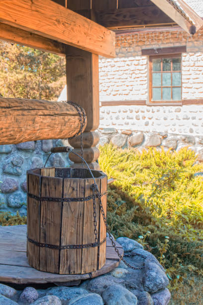 istock Bucket on the well 1325264788