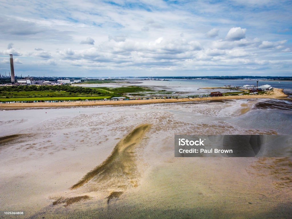 Aerial view of Calshot, Hampshire Aerial view of Calshot, Hampshire at low tide Above Stock Photo