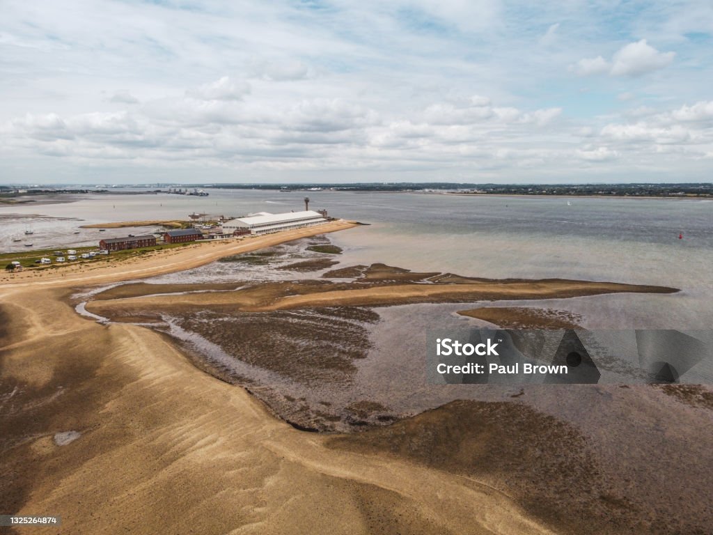 Aerial view of Calshot, Hampshire Aerial view of Calshot, Hampshire at low tide Beach Stock Photo