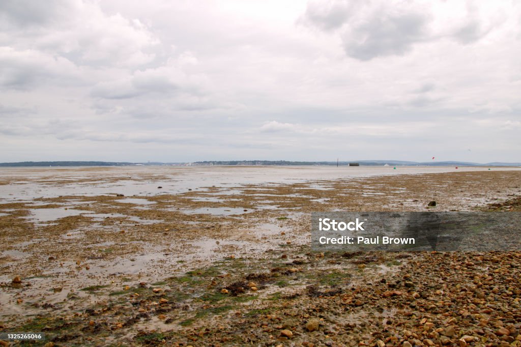 Calshot Beach, Hampshire at low tide. Atmosphere Stock Photo
