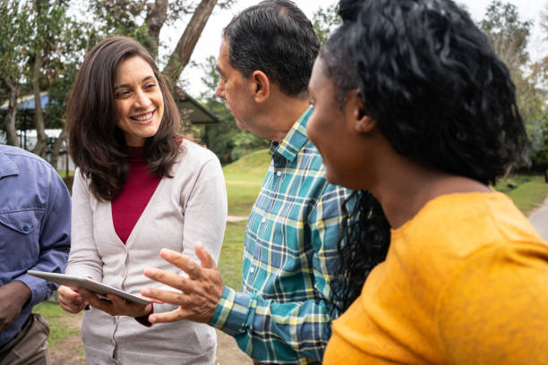 istock Farm manager discussing data over a digital tablet with coworkers 1325266427