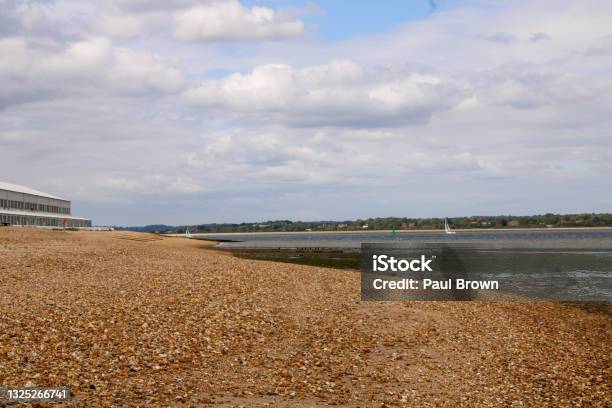 Calshot Beach Southampton Hampshire Stock Photo - Download Image Now - Beach, Cloud - Sky, Coastal Feature