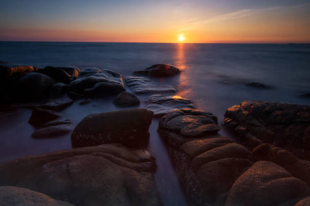 istock Motion seascape through stone arch at sunset, Rayong 1325266897