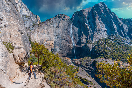 Upper Yosemite Fall, enjoying the views of the waterfall from below. California, United States