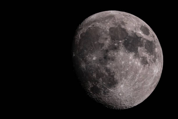 istock Waxing Gibbous Moon Over Black Sky 1325268830