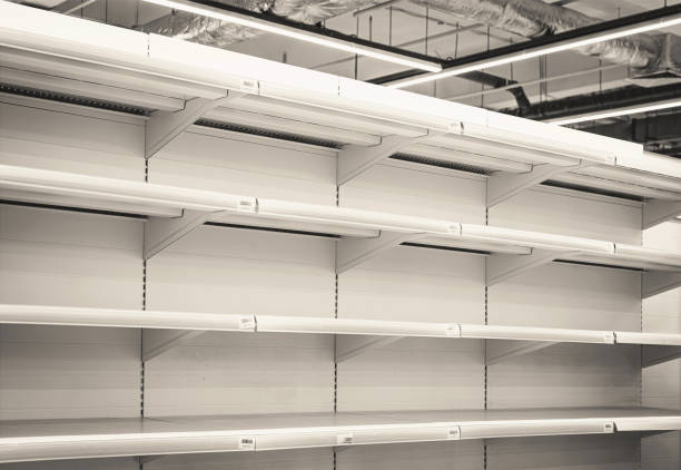 istock empty new rack shelves in supermarket 1325269186